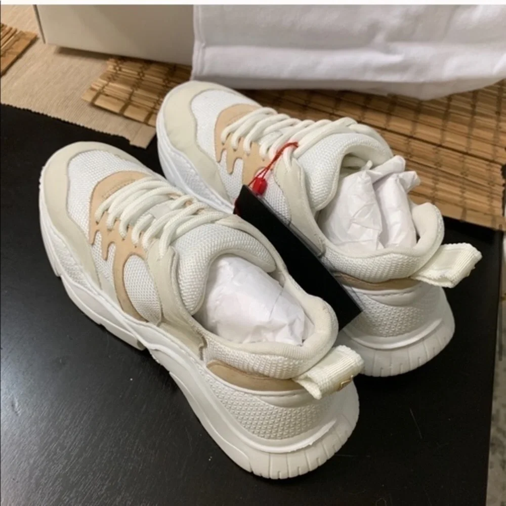 Schutz white sneakers “dad sneakers”
